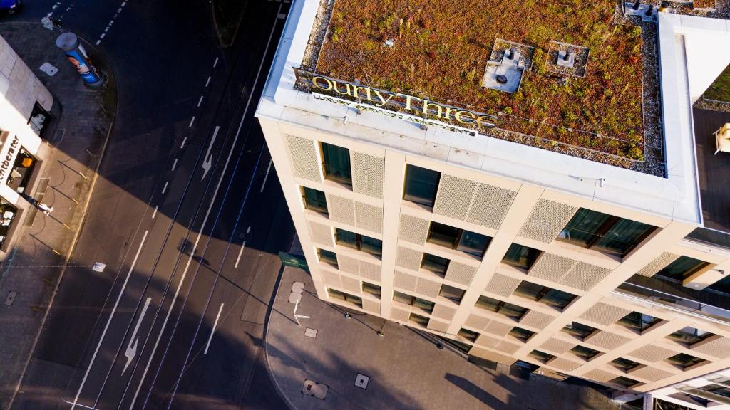 an overhead view of a building with grass on the roof at Fourty Three Luxury Serviced Apartments in Düsseldorf