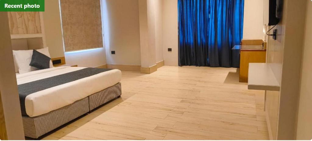 Postel nebo postele na pokoji v ubytování Hotel Prakash Continental