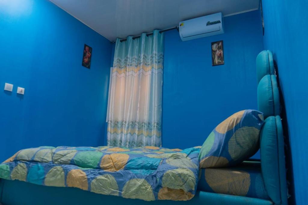 Ένα ή περισσότερα κρεβάτια σε δωμάτιο στο Résidence belle demeure