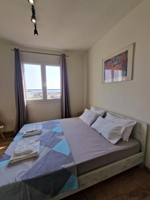 Posteľ alebo postele v izbe v ubytovaní City Center Penthouse Apartment