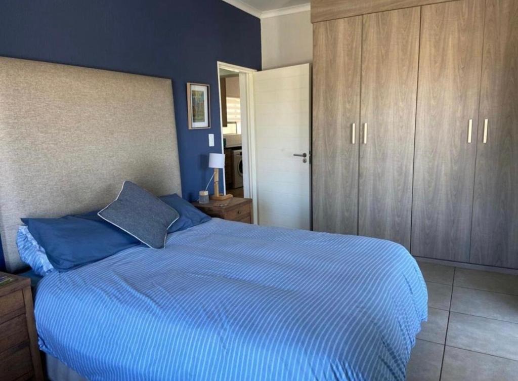 Ένα ή περισσότερα κρεβάτια σε δωμάτιο στο Regal Retreat