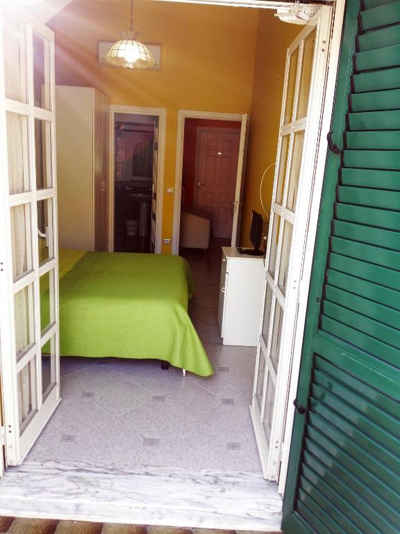 Postel nebo postele na pokoji v ubytování Albergo B&B Ristorante Grace