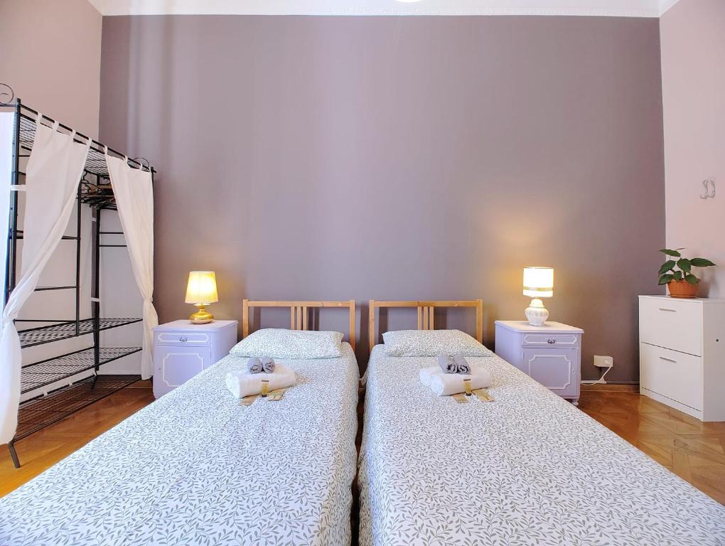 Postel nebo postele na pokoji v ubytování B7 Hostal