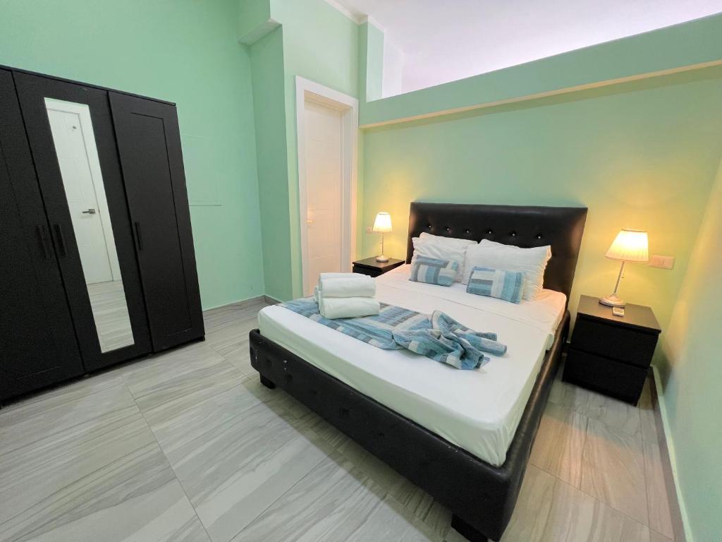 Krevet ili kreveti u jedinici u okviru objekta OLAS DEL CARIBE - VACATION SUITES with ROOFTOP POOL - PLAYA LOS CORALES