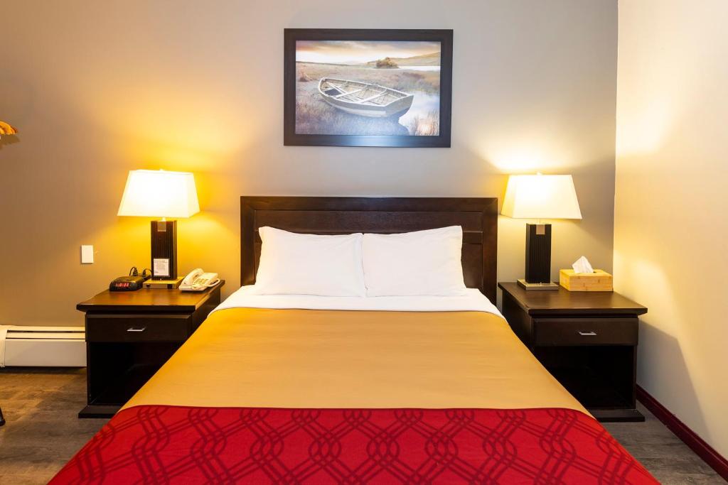 Postel nebo postele na pokoji v ubytování Econo Lodge
