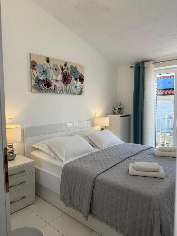 Posteľ alebo postele v izbe v ubytovaní Apartment Sea