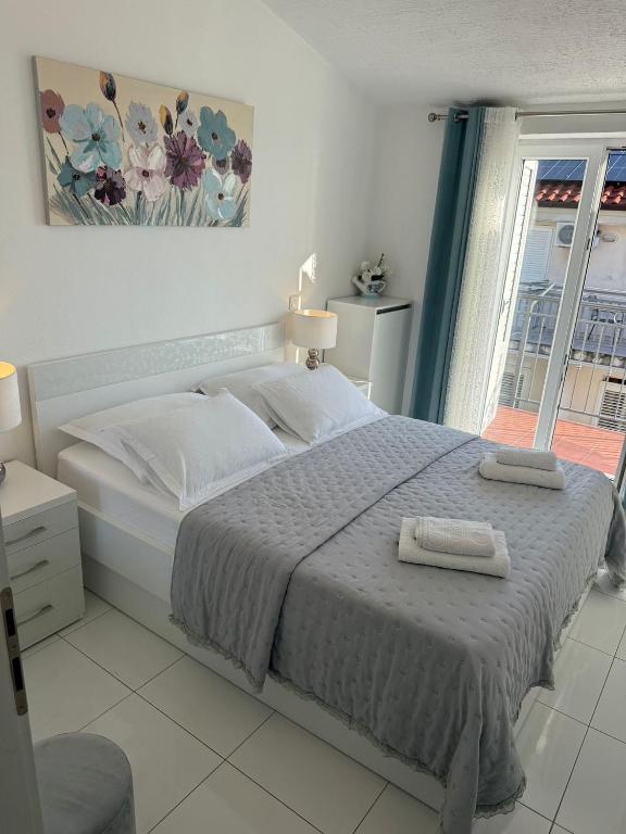 Posteľ alebo postele v izbe v ubytovaní Apartment Sea