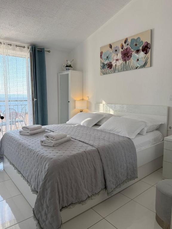 Posteľ alebo postele v izbe v ubytovaní Apartment Sea