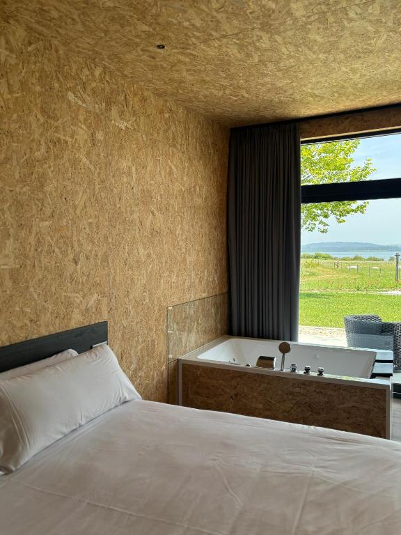 Postel nebo postele na pokoji v ubytování AIR FERVENZA