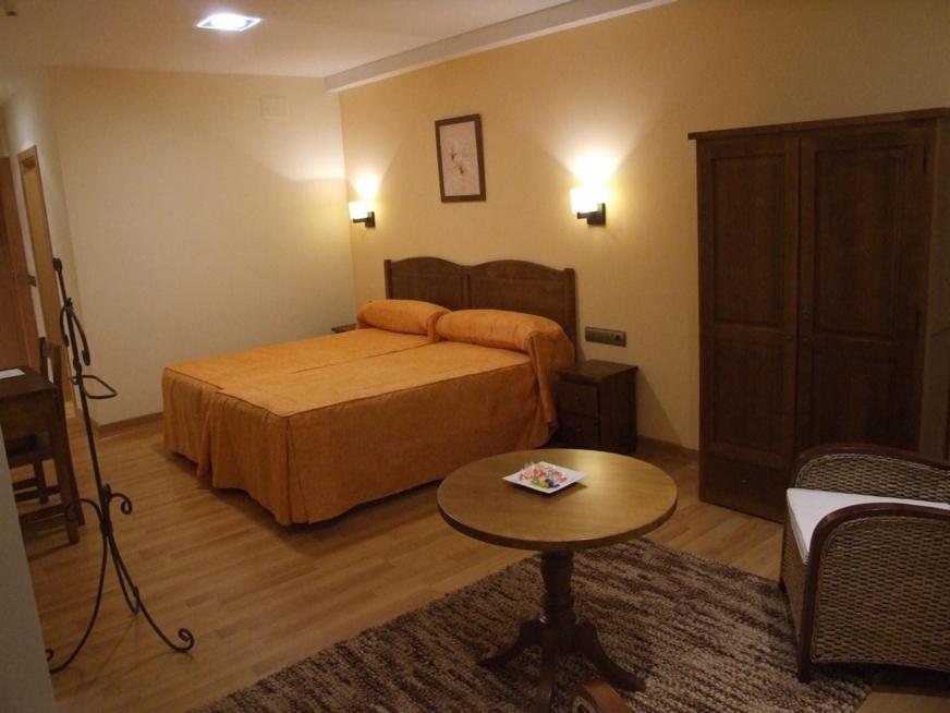 Postel nebo postele na pokoji v ubytování Hotel Pattaya
