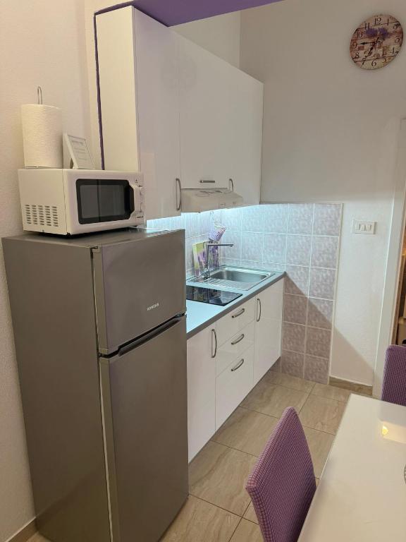 Kuchyňa alebo kuchynka v ubytovaní Apartment Universe
