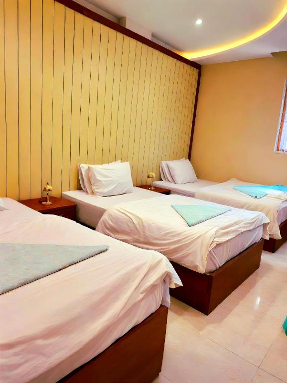 Postel nebo postele na pokoji v ubytování Pyramids Grand View Hotel