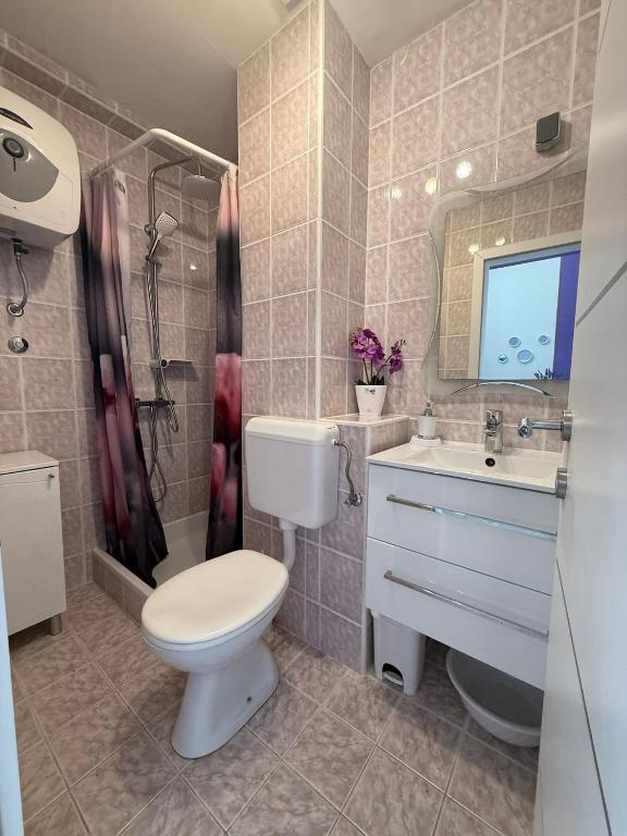 Kúpeľňa v ubytovaní Apartment Universe