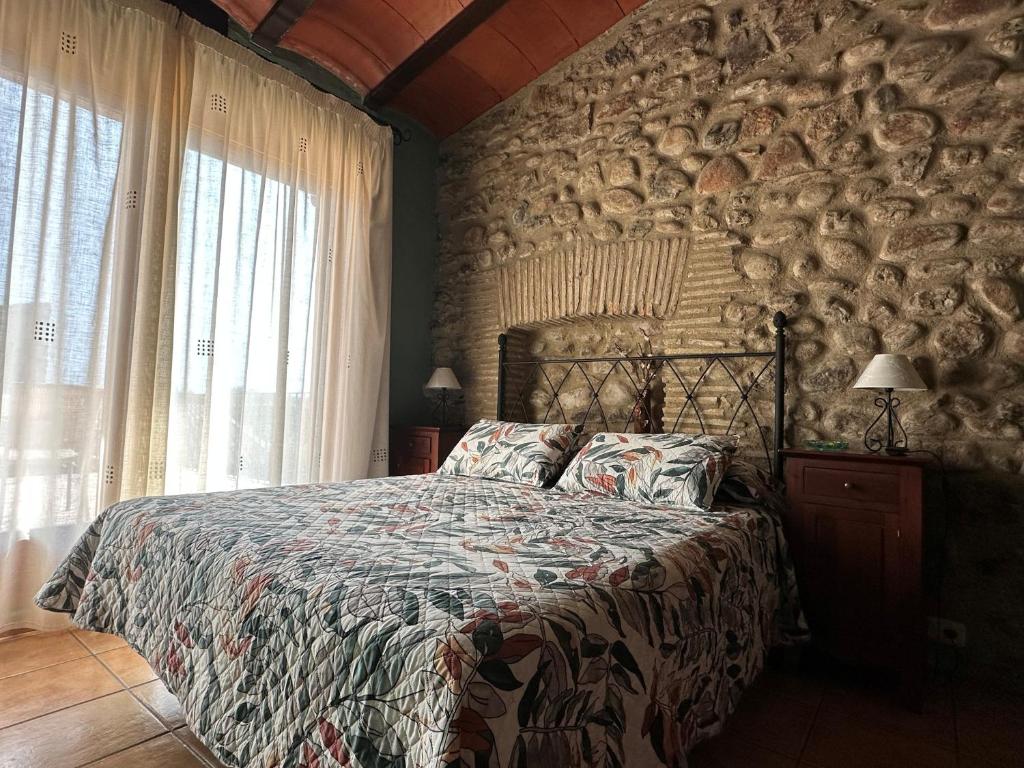Postel nebo postele na pokoji v ubytování Turisme rural Can Genis