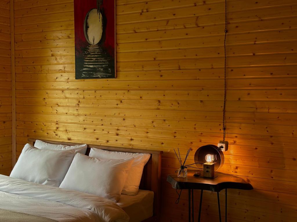 Postel nebo postele na pokoji v ubytování Rakursi