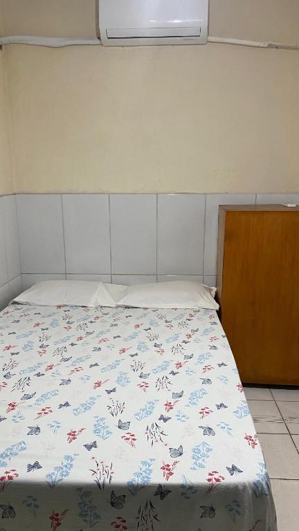Postel nebo postele na pokoji v ubytování Pousada e Alojamento Engenho de Itaguaí