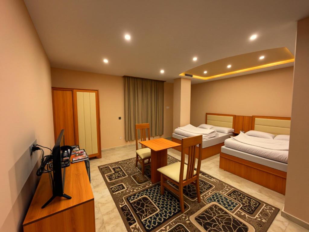 Postel nebo postele na pokoji v ubytování Pyramids Grand View Hotel