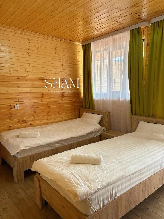 Postel nebo postele na pokoji v ubytování Guest house SHAM