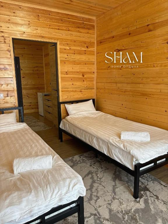 Postel nebo postele na pokoji v ubytování Guest house SHAM