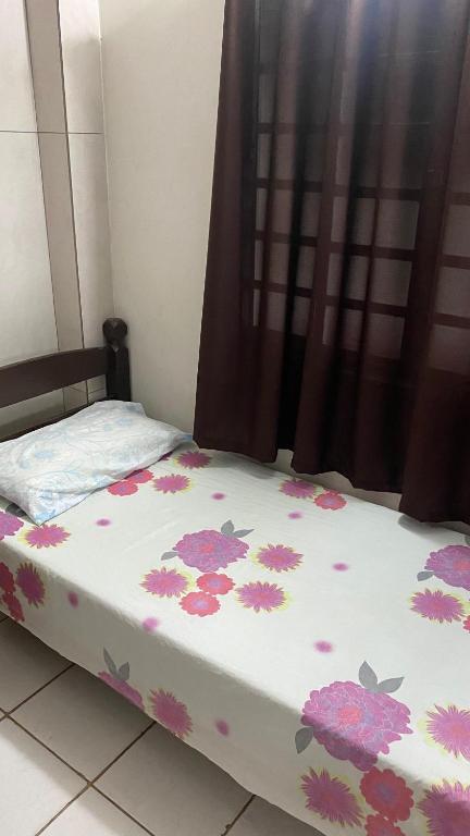 Postel nebo postele na pokoji v ubytování Pousada e Alojamento Engenho de Itaguaí