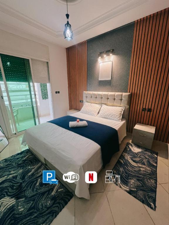 Postel nebo postele na pokoji v ubytování Perfect Cozy Apartment in City Center Hamrya