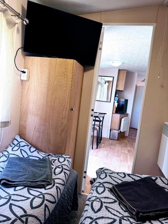 Postel nebo postele na pokoji v ubytování FarmaKolonia