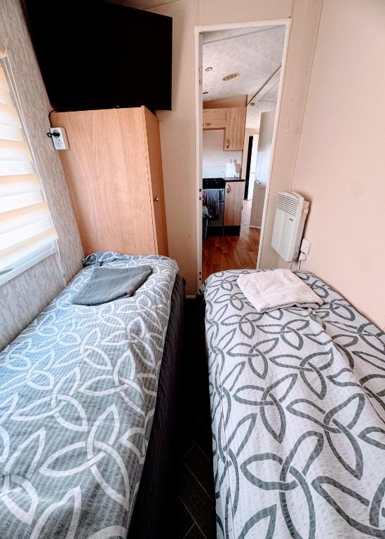 Postel nebo postele na pokoji v ubytování FarmaKolonia