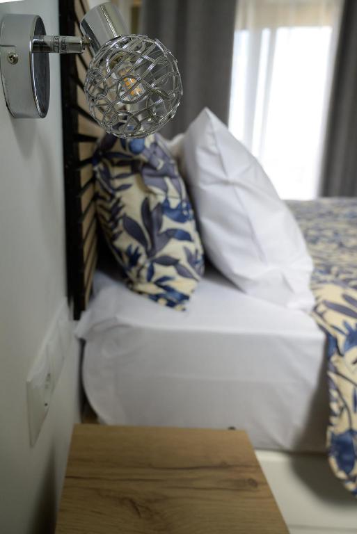 Postel nebo postele na pokoji v ubytování PAVEL apartments