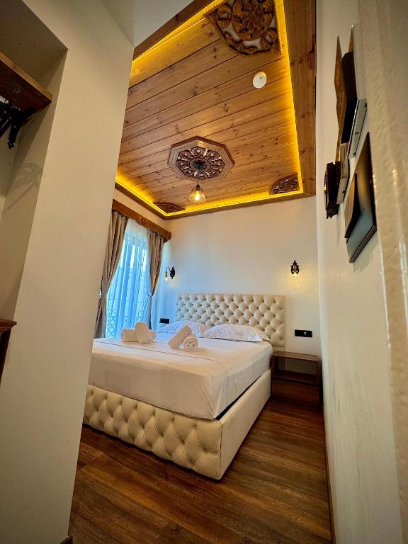 Postel nebo postele na pokoji v ubytování Martin Luxury Hotel