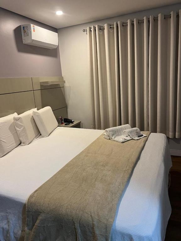 Postel nebo postele na pokoji v ubytování Hotel Oceania