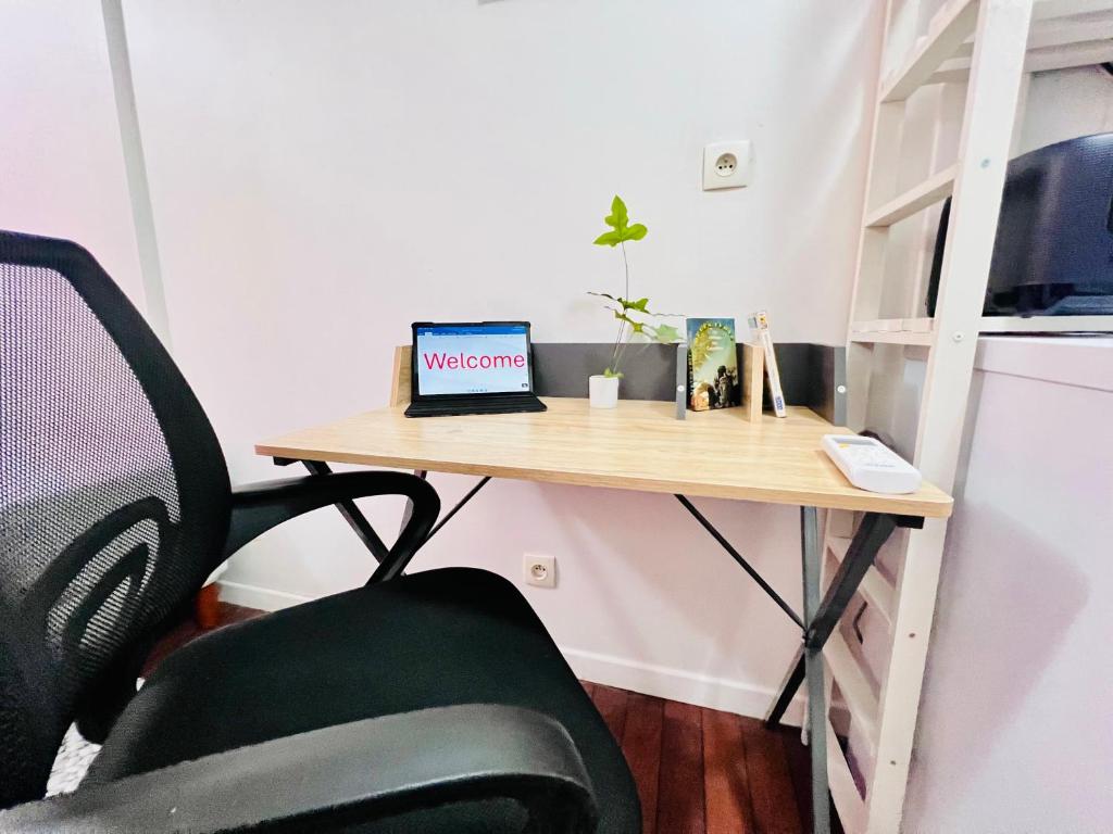 TV a/nebo společenská místnost v ubytování L amour wifi Clim balcon