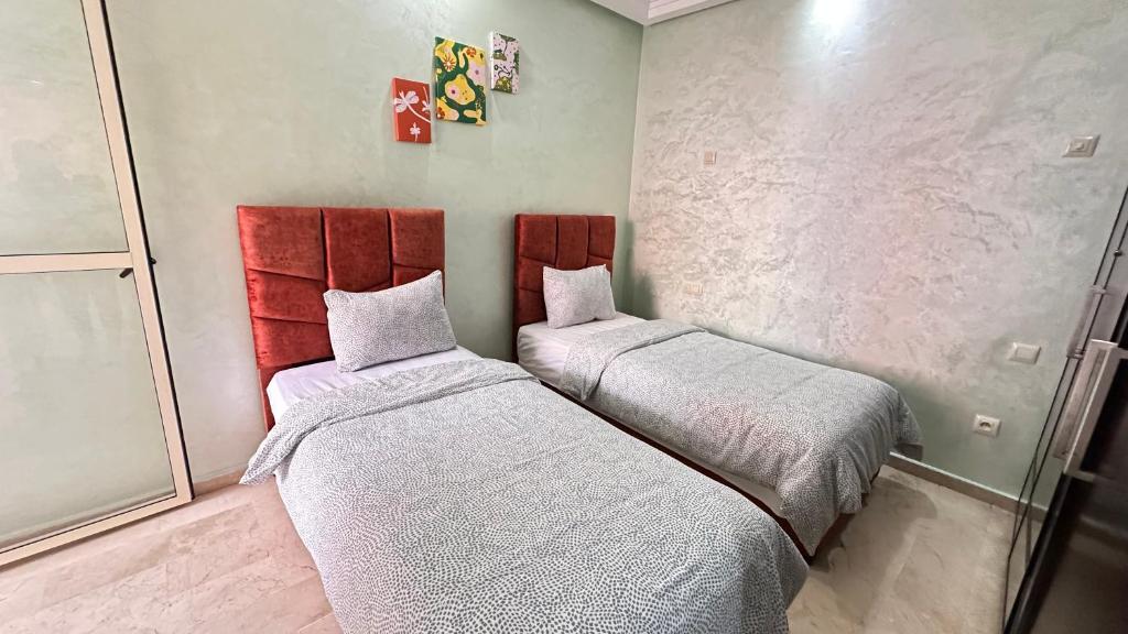 Postel nebo postele na pokoji v ubytování Paradise Casablanca