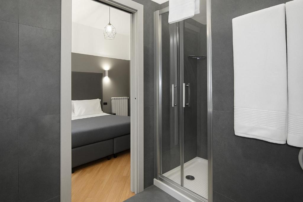 Postel nebo postele na pokoji v ubytování Piazza Carità