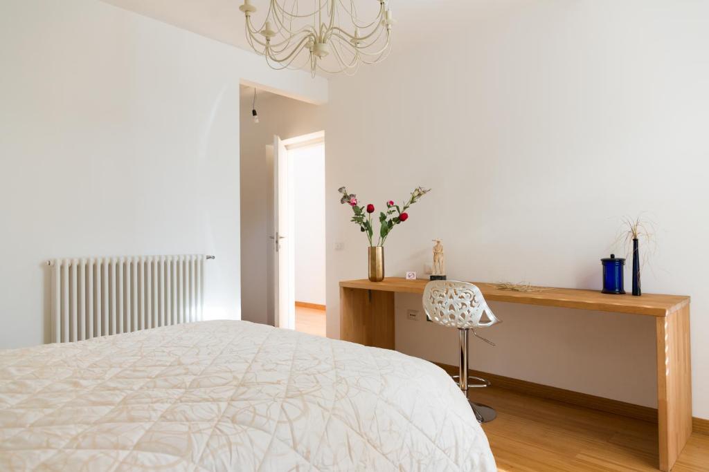 A bed or beds in a room at Guest House Le Acacie