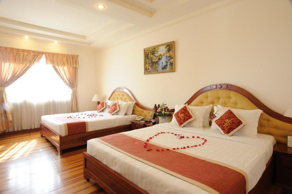 Hoang Yen 2 Hotel - King Room Met Twee Kingsize Bedden