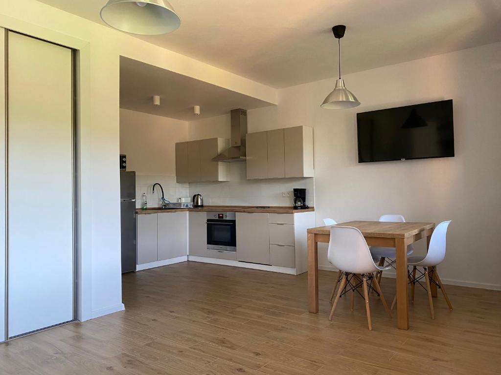 Kuchyňa alebo kuchynka v ubytovaní Apartamenty Asturia Rymanów Zdrój