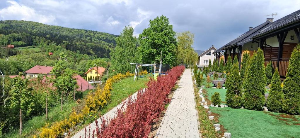 Vonkajšia záhrada v ubytovaní Apartamenty Asturia Rymanów Zdrój