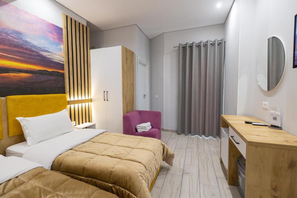 Postel nebo postele na pokoji v ubytování Hotel Beler