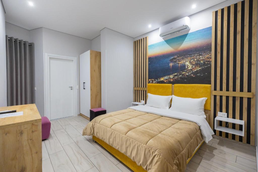 Postel nebo postele na pokoji v ubytování Hotel Beler