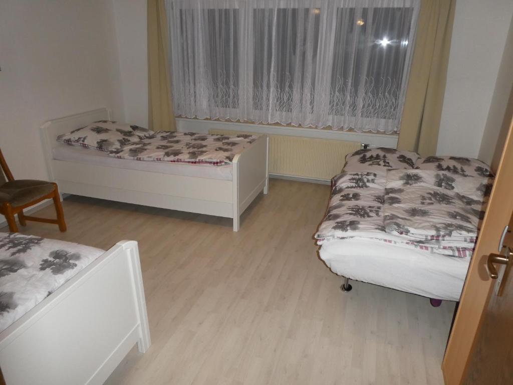 Postel nebo postele na pokoji v ubytování FeWo Ruhe