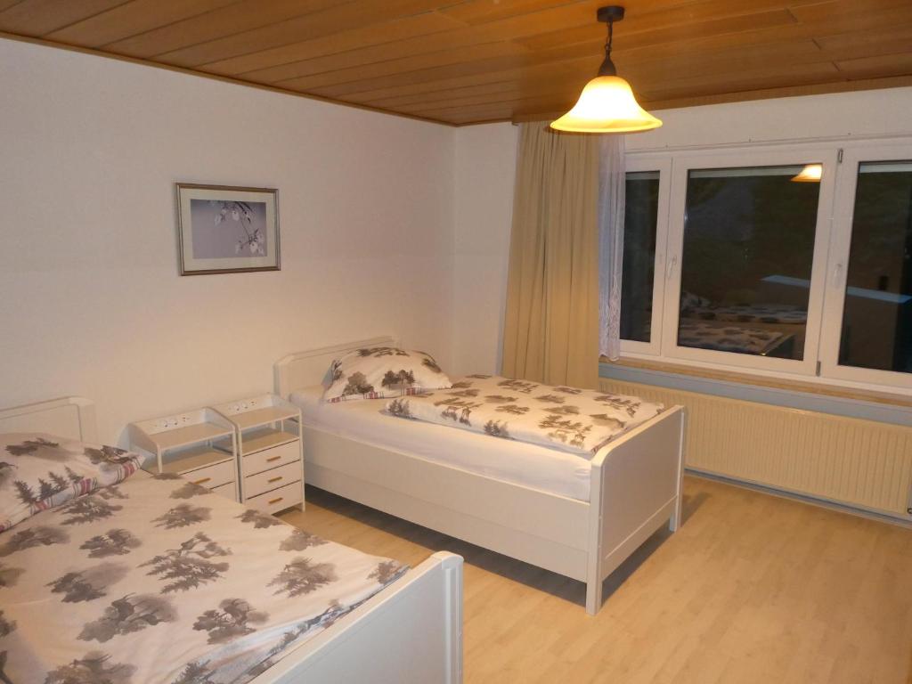 Postel nebo postele na pokoji v ubytování FeWo Ruhe
