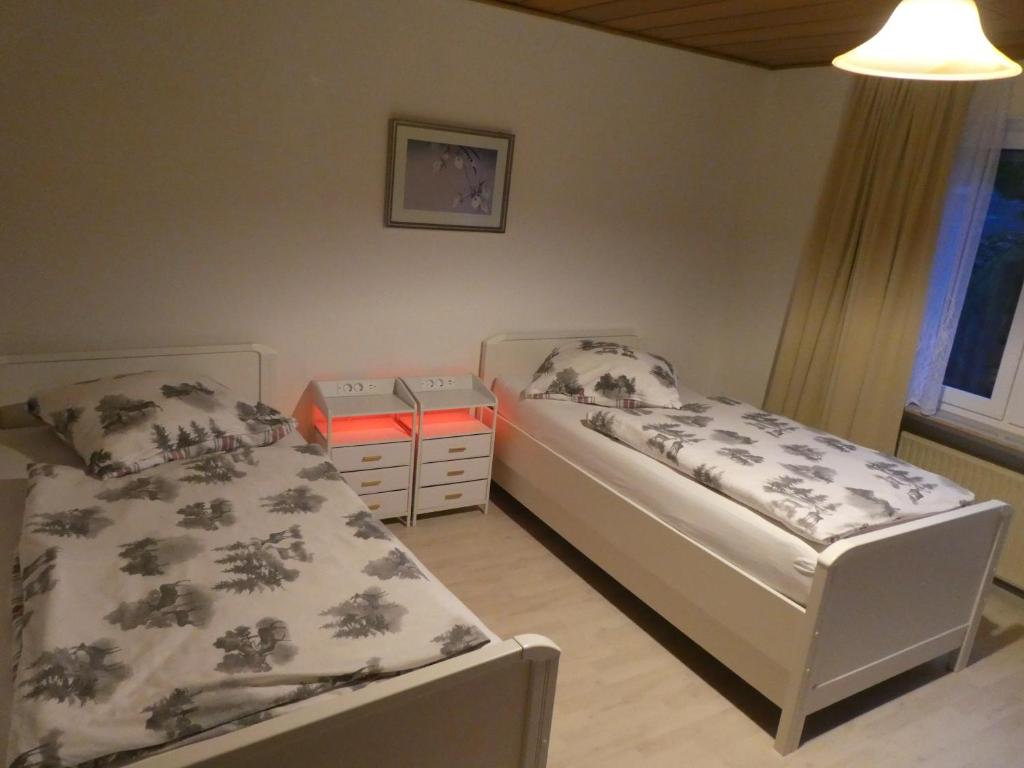 Postel nebo postele na pokoji v ubytování FeWo Ruhe