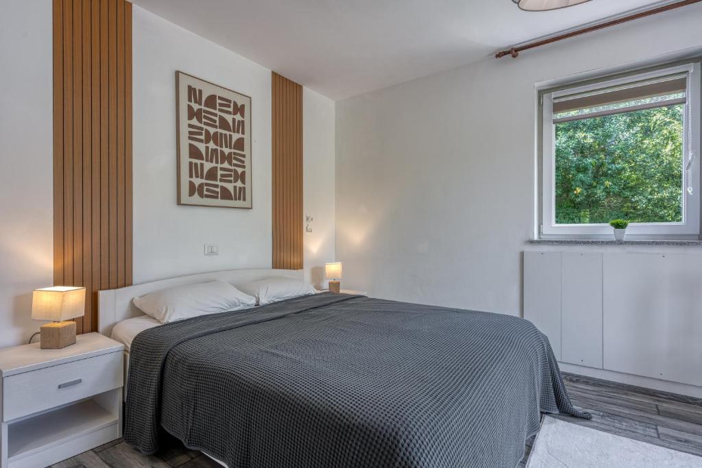 Postel nebo postele na pokoji v ubytování Villa Kontesici 14