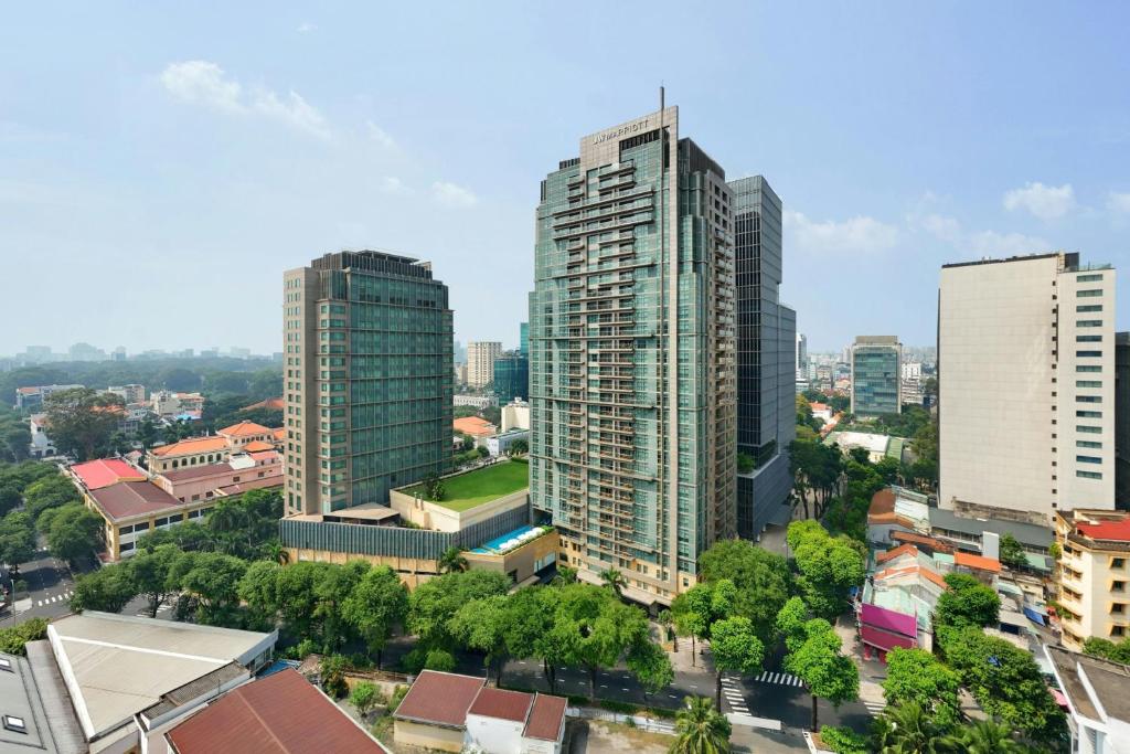 an aerial view of a city with tall buildings at JW Marriott Hotel & Suites Saigon, The Apartments in Ho Chi Minh City
