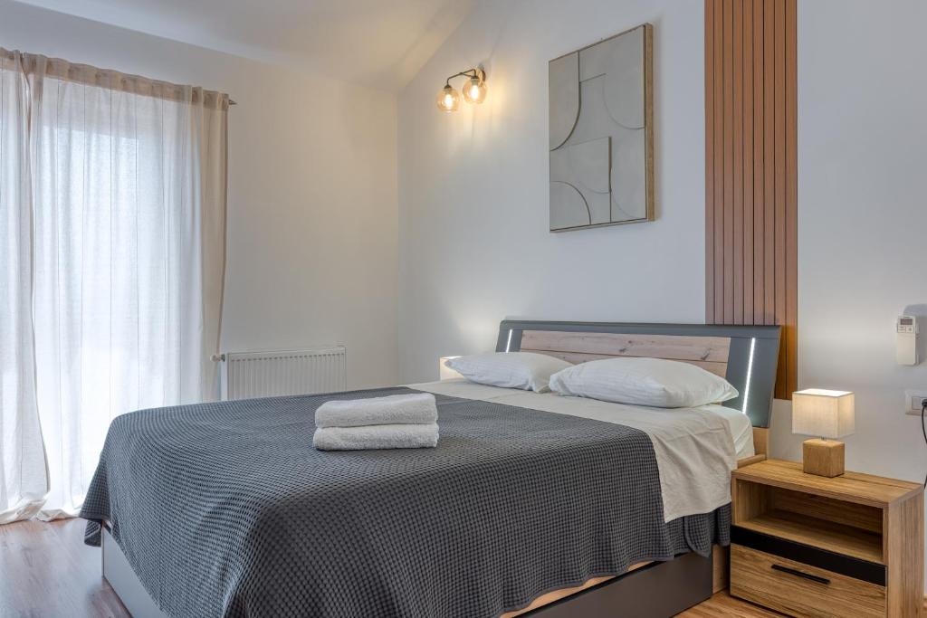 Posteľ alebo postele v izbe v ubytovaní Villa Kontesici 12