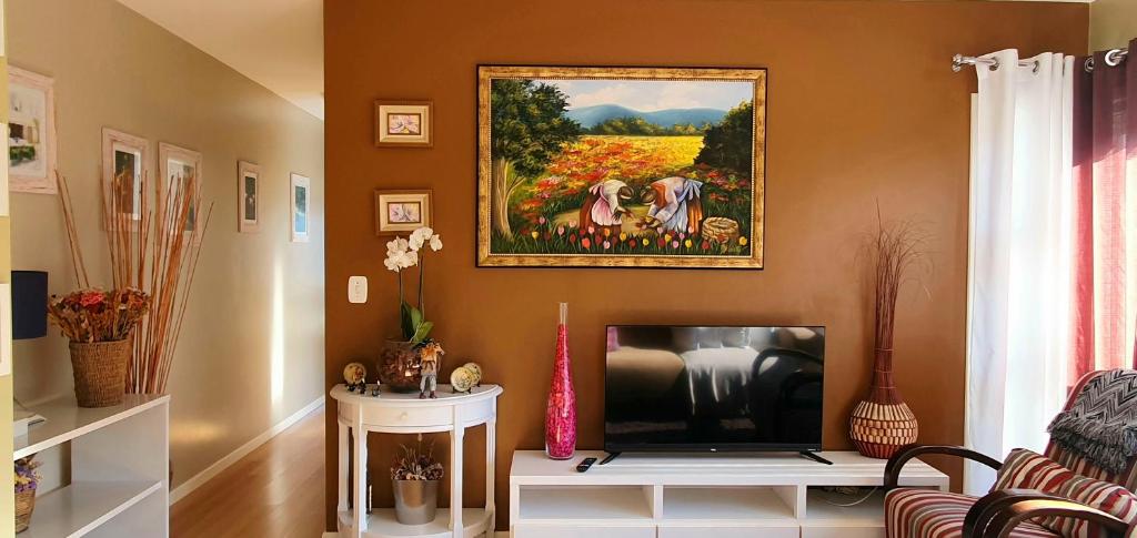 Et tv og/eller underholdning på EXCELENTE Apto