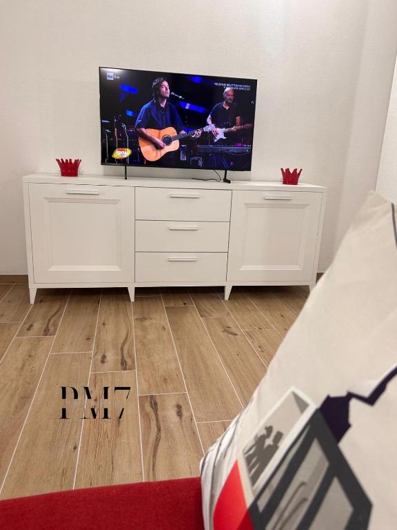 TV a/nebo společenská místnost v ubytování PM 7 Largo Bruno Ciari