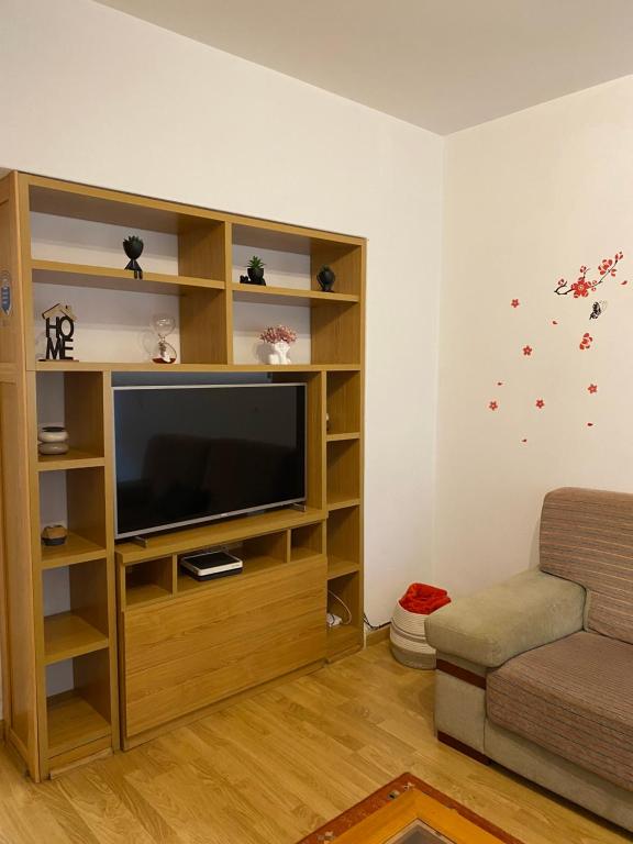 TV a/nebo společenská místnost v ubytování CERCA DE TODO