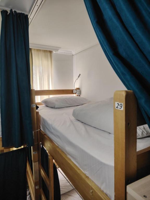 Voodi või voodid majutusasutuse Palm Guesthouse toas