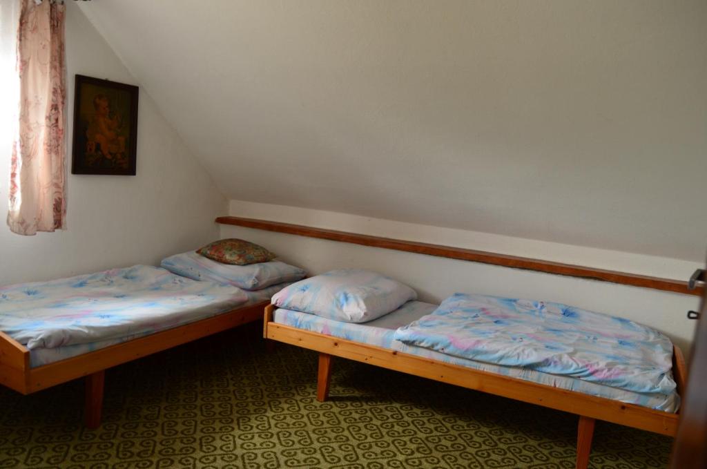 Postel nebo postele na pokoji v ubytování Apartment Natalia